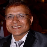 Dr Satish Midha